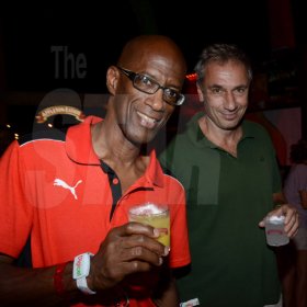 Winston Sill/Freelance Photographer
Bacchanal Jamaica final Friday Fete featuring Destra Garcia, held at Mas Camp, Stadium North on Friday night April 11, 2014. Here are Clement Lawrence (left), Managing Director, J Wary and Nephew;  and Stefano Saccardi (right), General Counsel and Business Development Officer, Gruppo Campari, inside the Forbidden Estate VIP Lounge.