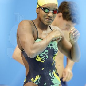 Ricardo Makyn/Staff Photographer
Alia's Victory in the Semifinal at the Aquatic Centre Olympic Park. The Bob Marley Swimsuit that Alia was wearing was just for the warm up
session before the Semi's