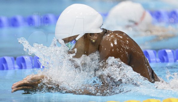 Ricardo Makyn/Staff Photographer
Alia Atkinson winning Her Heat in the Women's 100 M Breaststroke  to move an to the Semifinal at the Aquatics Centre at the Olympic Park.