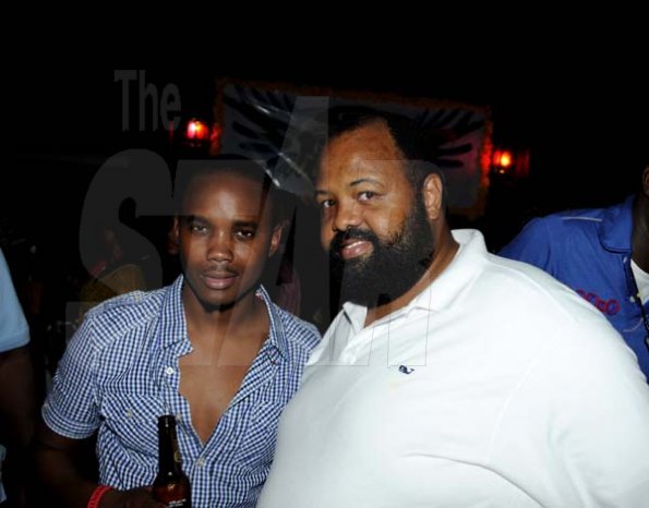 Winston Sill / Freelance Photographer
Absinthe, Sunset Vista Party, held at Morgan's Harbour Hotel, Port Royal on Sunday night July 8, 2012. Here are  Kamal Powell (left), of Red Stripe; and Solomon Sharpe (right), of Main Event.