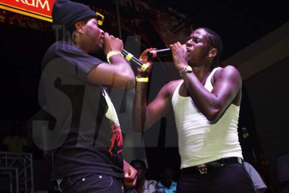Anthony Minott/Freelance Photographer
Aidonia (right), and Deablo in combination during Aidonia in concert at Famous Night Club last Sunday.