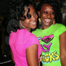 Roxroy McLean Photo

These two females were all smiles while selectors Boom Boom and Foota Hype provided the music, at the weekly Alliance Happy Thursday dance, held at Kno Limits Sports Bar, in St Andrew.