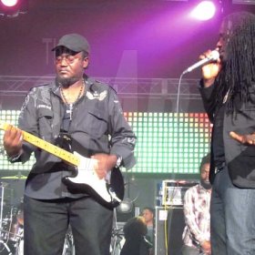 I-Octane (right) and a member of the Ruff Kut band thrills the audience with their stage antics