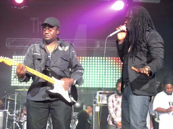 I-Octane (right) and a member of the Ruff Kut band thrills the audience with their stage antics