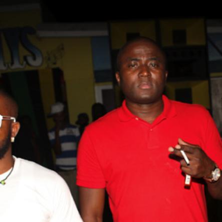 Anthony Minott/Freelance Photographer
A crew shows their support for host D'Angel during Jamaica 50 Edition of An'so Thursdays atop the roof of Cookie's Night Club, Port Henderson Road, Portmore, St Catherine on Thursday, August 2, 2012.