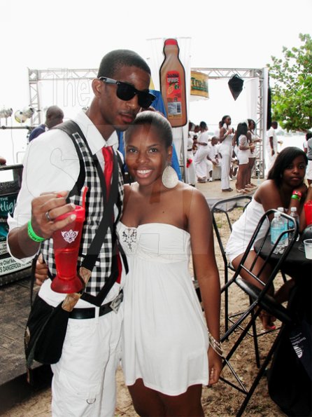 Matthew Richards and Annya Gordon Whyte are enjoying every minute of Smirnoff Daydreams, on Saturday. 


********************************************************************** July 30th, part of the Smirnoff Dream weekend at Long Bay Beach Negril