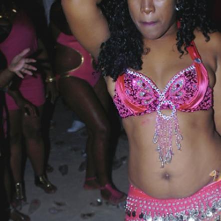 Mark Titus 


Doing the belly dance at 'Pretty In Pink'  during the 2011 staging of Appleton Temptation Isle's in Negril last weekend.