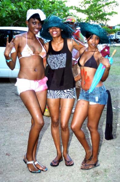 Winston Sill / Freelance Photographer
                                                                              These beautiful females took timeout to strike a sexy pose for our cameraman at Beach Jouvert, held at James Bond Beach, Orocabessa, St Mary on Saturday April 3, 2010.