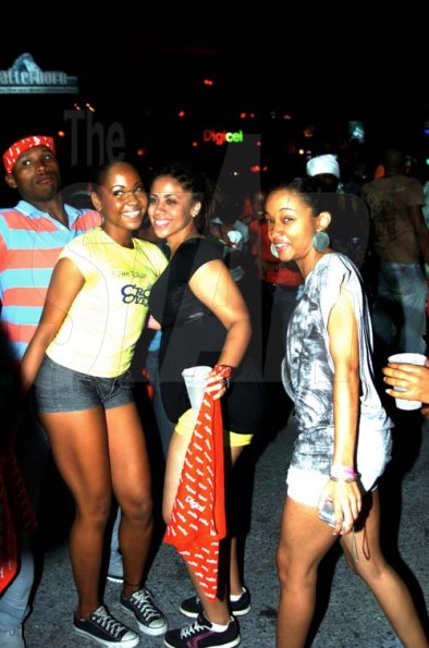 Winston Sill / Freelance Photographer
These three women paused from the partying to pose for photos at Bacchanal Jamaica Friday night Carnival Lyme, held at the Mas Camp, Oxford Road, New Kingston on Friday.