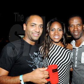 Winston Sill / Freelance Photographer
David Walton (left), of J. Wray and Nephew; Chantal  Raymond,  Miss Jamaica World and Shurwayne Winchester are spotted inside the Appleton Skybox at Bacchanal Jamaica fete with Pure Country and Applrton playing hosts, at Mas Camp, Oxford Road, New Kingston on Friday night.

*************************************************************************** April 1, 2011. Here are David Walton (left), of J. Wray and Nephew; Chantal  Raymopnd (centre). Miss Jamaica World; and Shurwayne Winchester (right)  inside the Appleton Skybox.