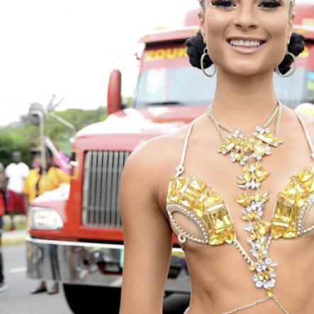 Patrick Planter/ Photographer<\n>Miss Universe Jamaica 2014 Kaci Fennell shimmers in gold, making the road march her very own runway for Bacchanal Carnival 2017.<\n>Bacchanal Jamaica Road March on Sunday April 23, 2017 at 9:00am