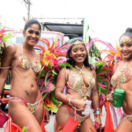 Patrick Planter/ Photographer
Gal pals (from left) Renee Rickhi, Francisca Griffiths and Brianna Reynolds are seen 'wining like they're single' on Bacchanal Jamaica Road March. 
Bacchanal Jamaica Road March on Sunday April 23, 2017 at 9:00am