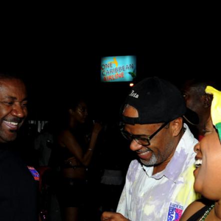 Winston Sill / Freelance Photographer
Bacchanal Jamaica and Appleton Jamaica Rum J'ouvert  and Road Parade under the theme "Alien Invasion", featuring Destra Garcia, held at The New Mas Camp, Stadium North on Friday night until daylight April 13, 2012.. Here are Phillip Paulwell (left); ----??? Bell (centre); and Lisa?? Bell (right).