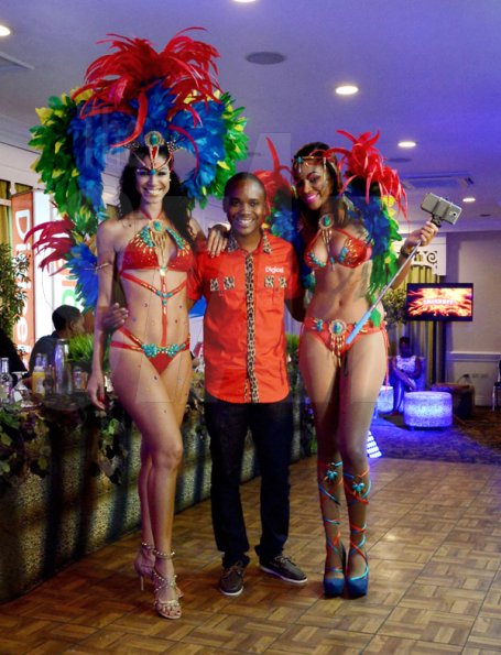 Winston Sill/freelance Photographer
 Bacchanal Jamaica presents the Official Launch of Bacchanal 2015 Carnival Season, under the theme "Untamed", held at Knutsford Court Hotel, Ruthven Road on Thursday night February 5, 2015.  Here are Yendi Phillipps (left); Kamal Powell (centre), of Digicel; and ------?????? (right).