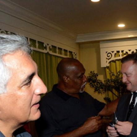 Winston Sill/freelance Photographer
 Bacchanal Jamaica presents the Official Launch of Bacchanal 2015 Carnival Season, under the theme "Untamed", held at Knutsford Court Hotel, Ruthven Road on Thursday night February 5, 2015.  Here are Michael Ammar (left), Director, Bacchanal Jamaica; Earl Franklin (second left), Director, Bacchanal Jamaica; Matthew Cripps (second right), Group General Manager, ATL Automotive; and Brian Walsh (right).