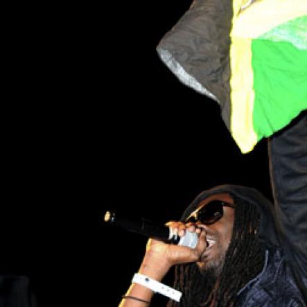 Winston Sill / Freelance Photographer
St Vincent artiste Skinny Fabulous waves a Jamaican flag during his performance at the Bacchanal Jamaica Carnival Fete held at Mas Camp, Oxford Road, New Kingston on Friday night.