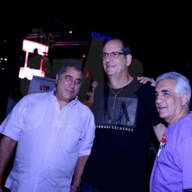Winston Sill/Freelance Photographer
Bacchanal Jamaica  New Year's  Party and showing of the 2014 Carnival Costumes, held at Mas Camp, Stadium North on Friday night January 3, 2014. Here are Gassan Azan (left); Ed Khoury (centre); and Michael Ammar Jr. (right).