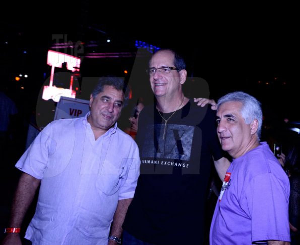 Winston Sill/Freelance Photographer
Bacchanal Jamaica  New Year's  Party and showing of the 2014 Carnival Costumes, held at Mas Camp, Stadium North on Friday night January 3, 2014. Here are Gassan Azan (left); Ed Khoury (centre); and Michael Ammar Jr. (right).
