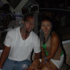 Janet Silvera Photo
 
Henry McCurdy Jr. and Tamara Patterson cooling out at the 5th anniversary Barefoot party at Tropical Beach in Montego Bay last Sunday night.