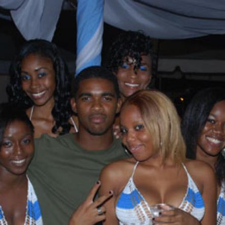 Janet Silvera Photo
 
Ameer Johnson (centre) is sandwiched by the Bay Wata girls, from L front row - Sandrine McIntosh, Thadia Williams and Marion Warren. Back row: from L- Keveisha Parker and Marcine Young at the Barefoot party at Tropical Beach in Montego Bay last Sunday night.