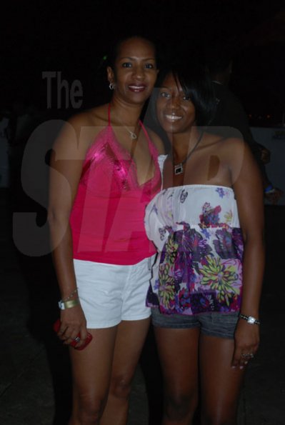 Janet Silvera Photo
 
Rena Forbes (left) and Jacinth Lynch at the Barefoot party at Tropical Beach in Montego Bay last Sunday night.