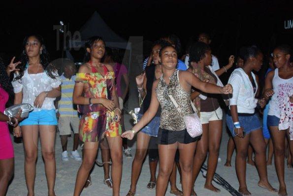 Janet Silvera Photo
 
These young women had a ball at the Barefoot party at Tropical Beach in Montego Bay last Saturday night.