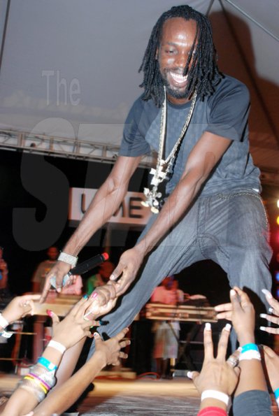 Janet Silvera Photo
 
The women literally worshipped at Movado's feet during his spine-tingling and mind blowing performance at the Barefoot party at Tropical Beach in Montego Bay last Sunday night.