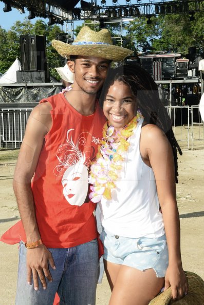 Winston Sill/Freelance Photographer<\n>Bacchanal Jamaica and Smirnoff sponsored Beach J'ouvert, held at James Bond Beach, Oracabessa, St, Mary on Saturday April 4, 2015.<\n>Winston Sill/Freelance Photographer<\n>Samantha Strachan and Johann McCulloch get close for a quick snap ahead of partying.