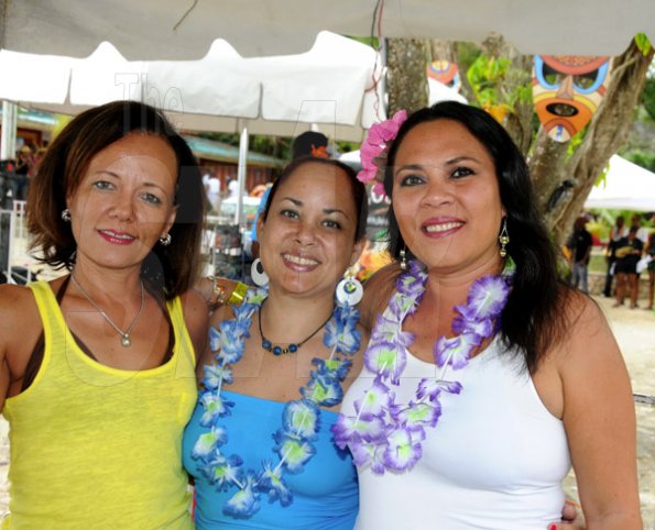 Winston Sill / Freelance Photographer
Bacchanal Jamaica Beach J'Ouvert Party, held at James Bond Beach, Oracabessa, St. Mary on  Saturday March 30, 2013. Here are Shelly Chang (left); SueGrant (centre); and Angie Anmmar (right).