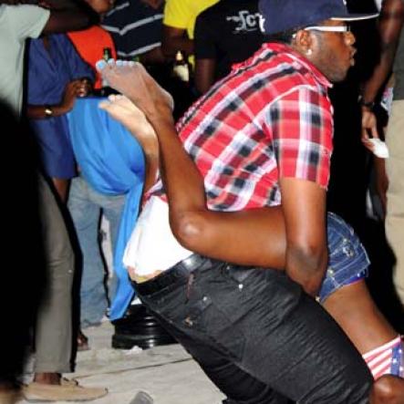 Winston Sill / Freelance Photographer
                                                                                   This couple had no fear when they took they danced together on the beach.                                                                                                                                                                                                                                                                                                                                Swag Party, held at Waves Beach, Portmore on Sunday night February 27, 2011.
