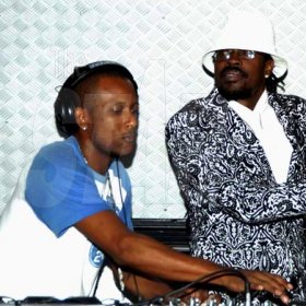 Winston Sill / Freelance Photographer
                                                                                    Beenie Man makes a grand entrance at his birthday bash, while selecter Supa Hype maintains the musical vibe on the turntables.                                                                                                                                                                                                                                                                                                                           August 21, 2010.