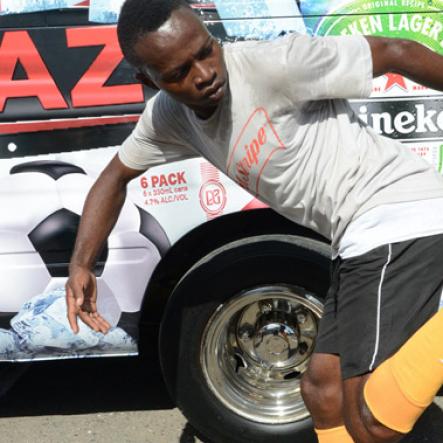 Ian Allen/Photographer
Cornel Thomas exhibiting his ball skills during the Beer Ballaz promotion on Tuesday at the Gleaner offices.