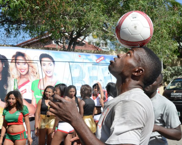 Ian Allen/Photographer
Cornel Thomas exhibiting his ball skills during the Beer Ballaz promotion on Tuesday at the Gleaner offices.