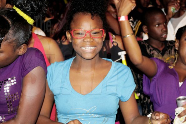 Anthony Minott/Freelance Photographer
This female fan seemed pleased with the show during Big Ship show dubbed: 'Tun up' St Catherine at Dinthill Technical High School, on Friday, March 11, 2011.