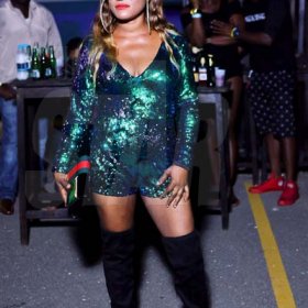 Anthony Minott/freelance photographerTanya glitters in green at Bounty Killer's birthday party held on Saturday at the waterfront, downtown Kingston.