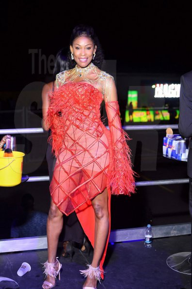 Anthony Minott
 Bounty Killer's lady love Claudia Rattigan commands the spotlight in a show stopping red number.