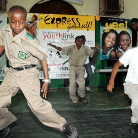 Ian Allen/Photographer
Several Calabar students show off their dance moves at Champs 100 celebration at Calabar High School on Friday.