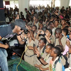 Ian Allen/Photographer
Popular entertainer Bugle gets into his element during his performace at the Gleaner Champs 100 High School Tour at Calabar yesterday. 


Champs 100 celebration at Calabar High School.