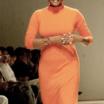 Winston Sill/Freelance Photographer
Cassandra Mottley (left) walks down the runway with a model wearing a creation from her Sheneil line at Caribbean Fashionweek last Friday at the National Indoor Sports Centre.



2009, Fashion Shows,held at the National Indoor Sports Centre (NISC), Independence Park on Friday night June 12, 2009.