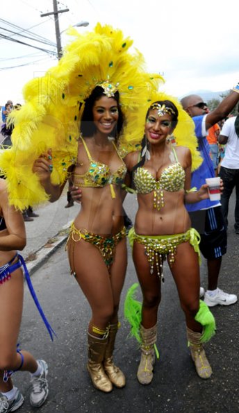 Winston Sill / Freelance Photographer
Bacchanal Jamaica Carnival Road Parade, on the streets of Kingston, held on Sunday April 7, 2013. Here is Yendi Phillipps (left) and a friend,