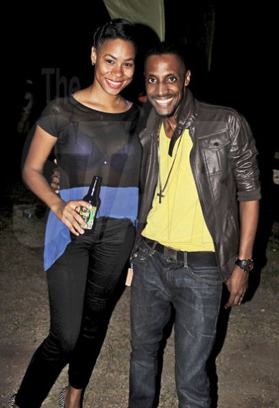 - Contributed

Red Stripe's Toni Ann Reid hangs out with Gospel singer Omari during Talawah Caution held at the Wickie Wackie Beach, St Thomas on Saturday Sept 15th.