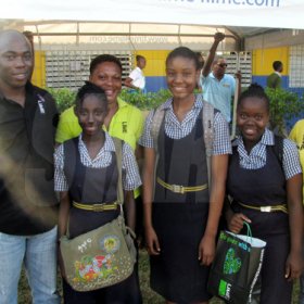 (From left): It was both work and play for Nathaniel Palmer,  Anna-Kaye Douglas, Vivete Barnes, Timeria Morgan, Kayona Watson and Theresa Barnes-Allen of LIME and Super J, respectively, at the STETHS leg of The Gleaner Champs 100 Tour.

Students lined the upper and lower corridors of buildings at St Elizabeth Technical High School (STETHS), buzzing with adrenaline and eager for The Gleaner Champs 100 Tour to begin. This was the fourth stop of the six-week-long tour and it has become clear that the vibes becomes more explosive the closer the tour gets to the centennial staging of the ISSA/GraceKennedy Boys and Girls' Championships on March 24-27.