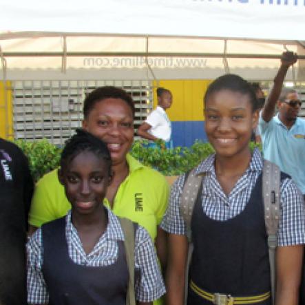 (From left): It was both work and play for Nathaniel Palmer,  Anna-Kaye Douglas, Vivete Barnes, Timeria Morgan, Kayona Watson and Theresa Barnes-Allen of LIME and Super J, respectively, at the STETHS leg of The Gleaner Champs 100 Tour.

Students lined the upper and lower corridors of buildings at St Elizabeth Technical High School (STETHS), buzzing with adrenaline and eager for The Gleaner Champs 100 Tour to begin. This was the fourth stop of the six-week-long tour and it has become clear that the vibes becomes more explosive the closer the tour gets to the centennial staging of the ISSA/GraceKennedy Boys and Girls' Championships on March 24-27.