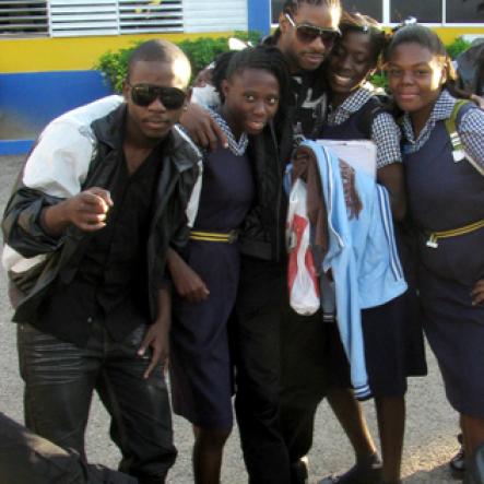 Dance group Shady Squad mixes and mingles with students.

Students lined the upper and lower corridors of buildings at St Elizabeth Technical High School (STETHS), buzzing with adrenaline and eager for The Gleaner Champs 100 Tour to begin.