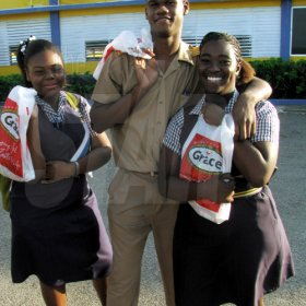 Shanice Lynch, Raffeet Young and Shanile Smith were eager to get their picture in Youthlink at The Gleaner Champs 100 Tour. 


Students lined the upper and lower corridors of buildings at St Elizabeth Technical High School (STETHS), buzzing with adrenaline and eager for The Gleaner Champs 100 Tour to begin. This was the fourth stop of the six-week-long tour and it has become clear that the vibes becomes more explosive the closer the tour gets to the centennial staging of the ISSA/GraceKennedy Boys and Girls' Championships on March 24-27.