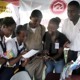 (From left): Yolanda Clarke, Raquel Broomfield, Anarwe Spooner, Sherifa Mcpherson and Alva Douglas, VMBS business development officers, were enthusiastic about showing the students how VMBS could benefit them. 


Students lined the upper and lower corridors of buildings at St Elizabeth Technical High School (STETHS), buzzing with adrenaline and eager for The Gleaner Champs 100 Tour to begin.