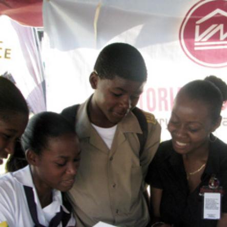 (From left): Yolanda Clarke, Raquel Broomfield, Anarwe Spooner, Sherifa Mcpherson and Alva Douglas, VMBS business development officers, were enthusiastic about showing the students how VMBS could benefit them. 


Students lined the upper and lower corridors of buildings at St Elizabeth Technical High School (STETHS), buzzing with adrenaline and eager for The Gleaner Champs 100 Tour to begin.