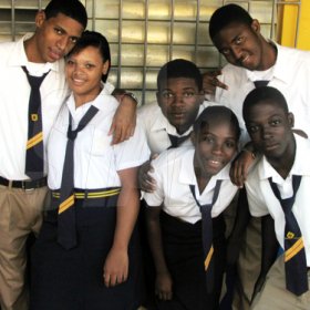 (From left): Rayon Myers, Gabrille Cunningham, Christopher McIntosh, Rochelle Clarke, Dejhaun Brown and Shavanory Green enjoy the hype of the tour.


Students lined the upper and lower corridors of buildings at St Elizabeth Technical High School (STETHS), buzzing with adrenaline and eager for The Gleaner Champs 100 Tour to begin.