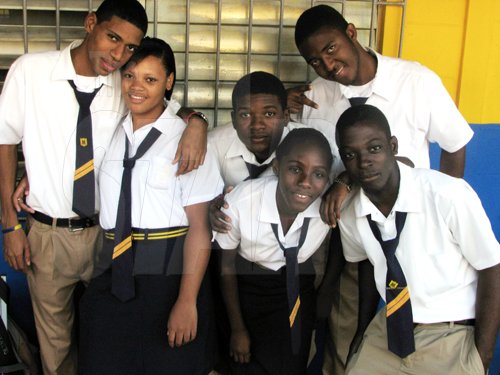 (From left): Rayon Myers, Gabrille Cunningham, Christopher McIntosh, Rochelle Clarke, Dejhaun Brown and Shavanory Green enjoy the hype of the tour.


Students lined the upper and lower corridors of buildings at St Elizabeth Technical High School (STETHS), buzzing with adrenaline and eager for The Gleaner Champs 100 Tour to begin.