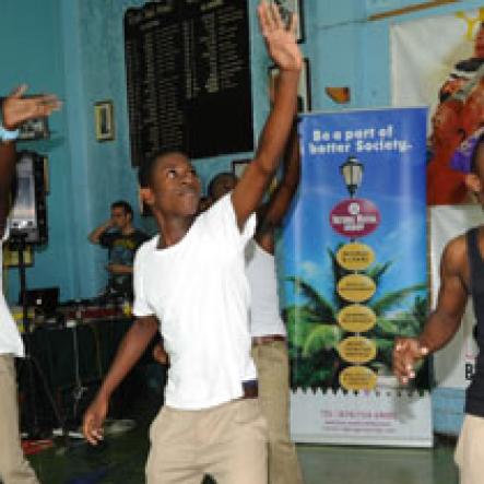 Ricardo Makyn/Staff Photographer.
St. Jago students dancing to a popular song at The Gleaner 100 Champs Tour held at the school on Friday, February 26, 2010.
